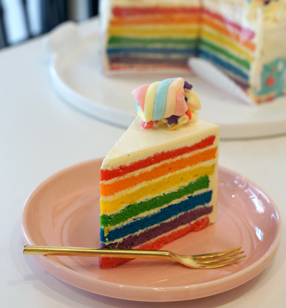 Rainbow slice cake from online cake delivery,littlecollins